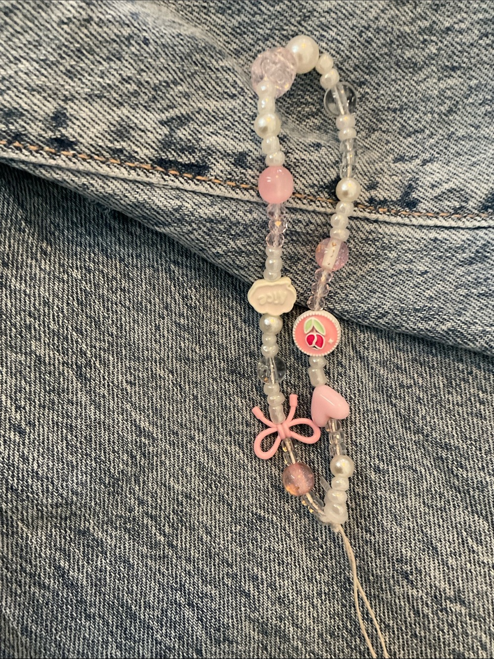 Wallet or phone keychain (randomly selected)